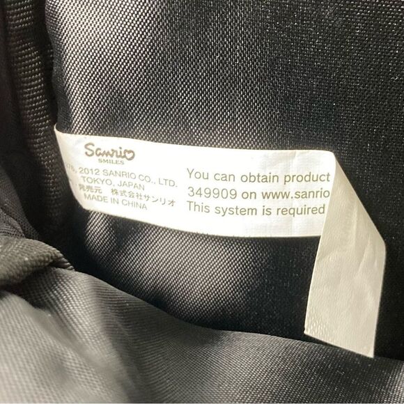 Sanrio Hello Kitty Puffer Sling Backpack - Picture 9 of 12